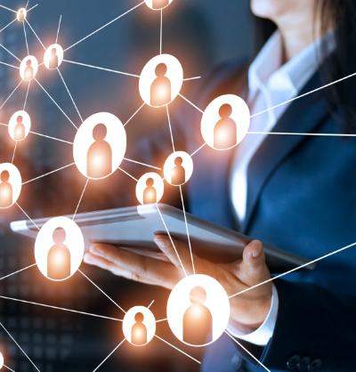 Woman with a tablet, connecting people icons in a network